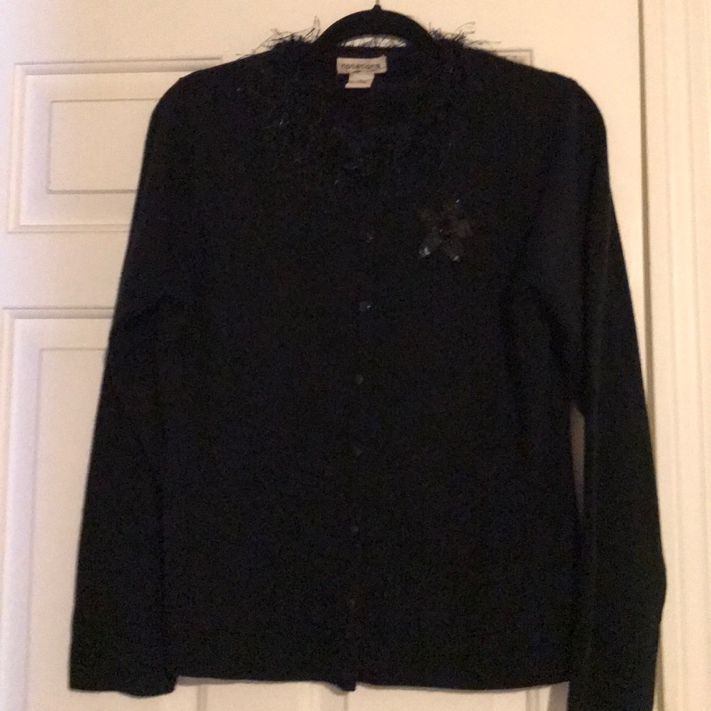 Sweater with fringe neckline
